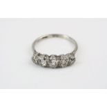 Diamond platinum five stone ring, five graduated round old cut diamonds, claw settings, total