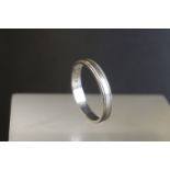 Platinum wedding band, reeded border, width approx 3mm, ring size N½