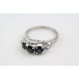 Sapphire and diamond 14ct white gold ring, three round greenish-blue sapphire, four claw settings, a