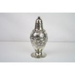 Norwegian silver sugar caster, baluster form with repoussé floral and foliate decoration, flower