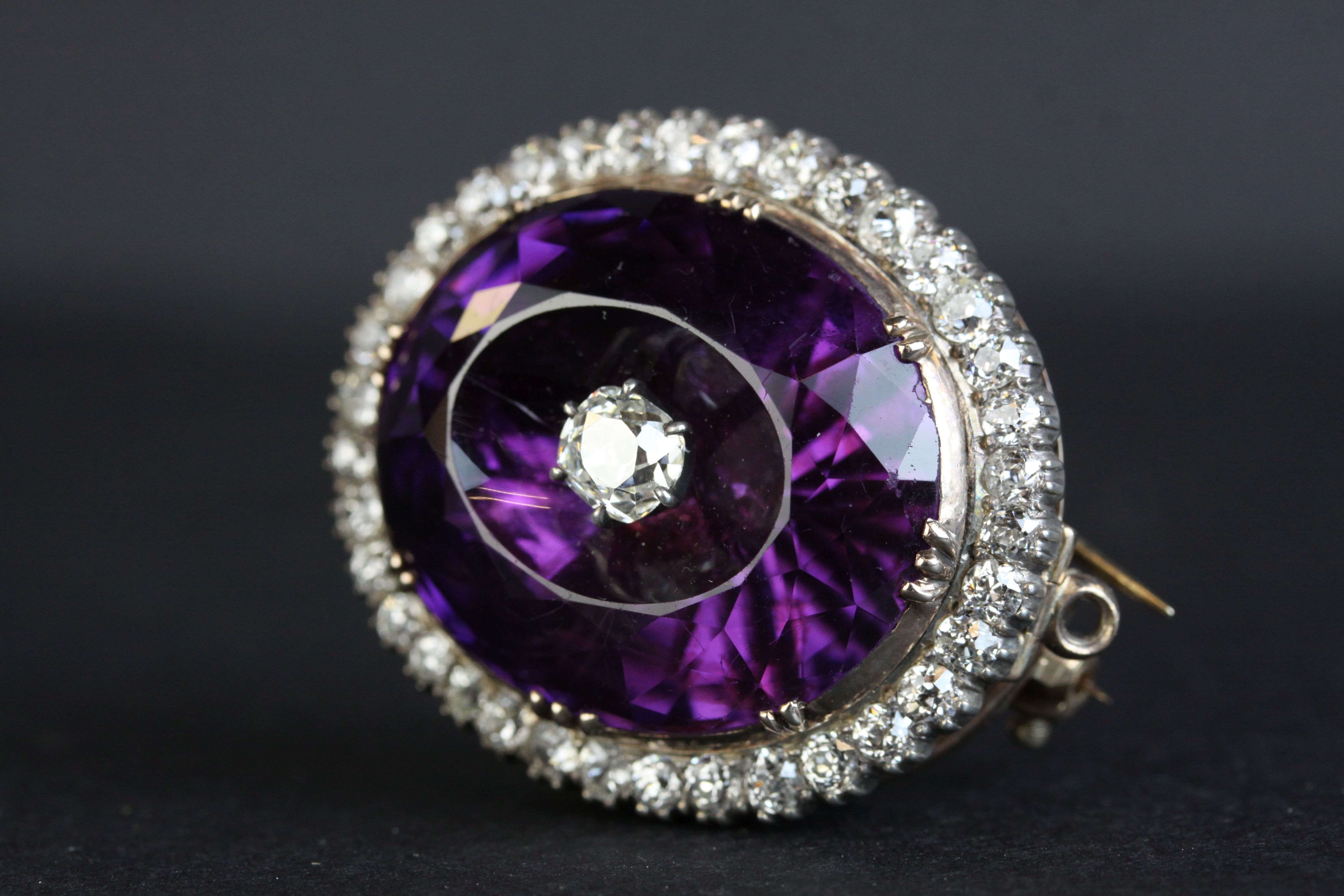 Victorian amethyst and diamond pendant brooch, the large oval faceted amethyst measuring approx 20. - Image 2 of 6