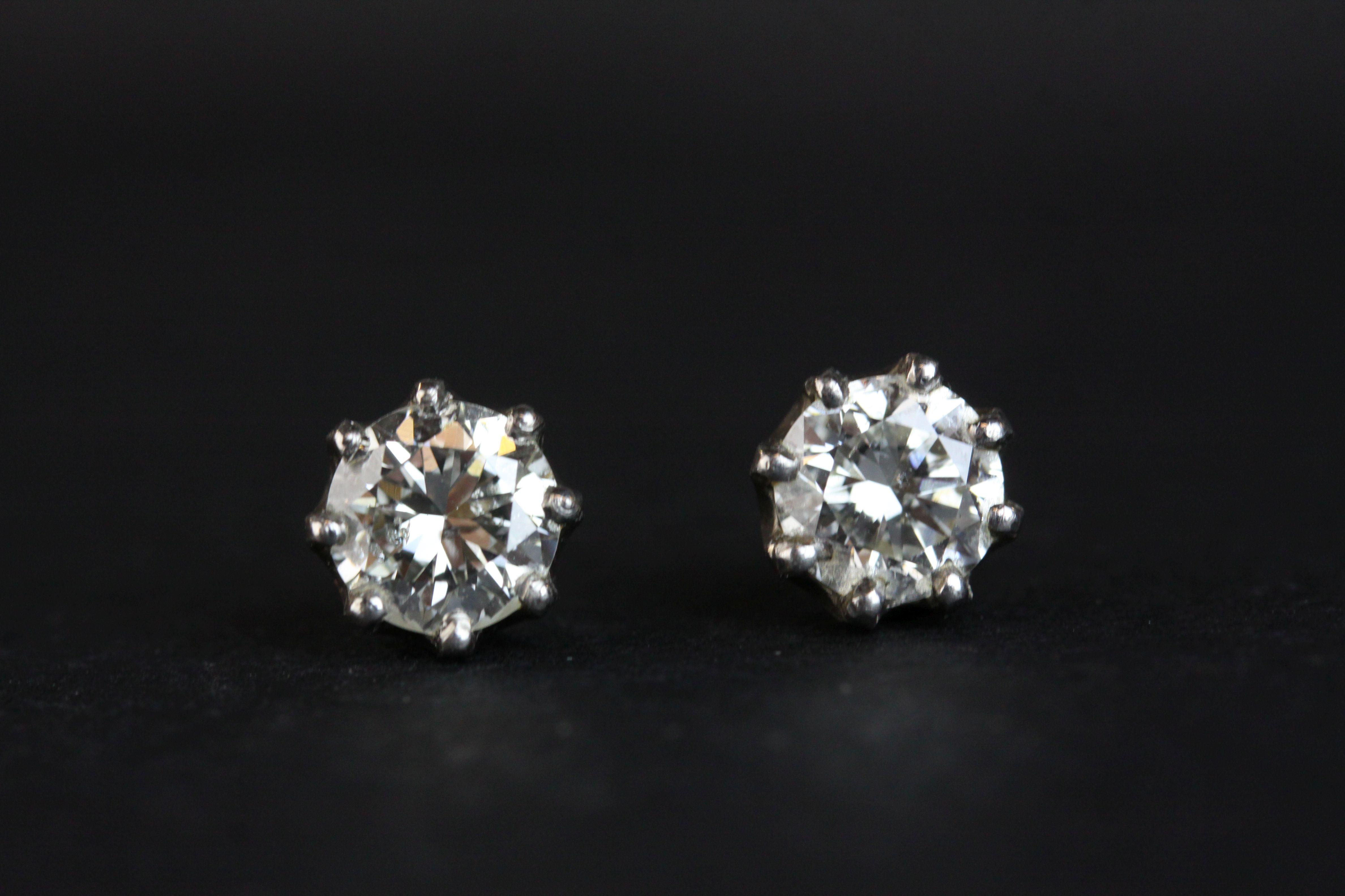 Pair of diamond solitaire stud earrings, each round brilliant cut diamond weighing approx 1.0 carat, - Image 3 of 8