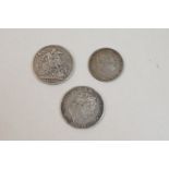 A 1819 George III Crown coin together with a 1821 George IIII Crown Coin and a 1834 George IIII Half