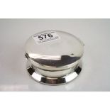 Silver footed circular trinket pot, engraved initials to hinged lid, the lid opening to reveal