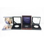 Three cased silver proof coins to include QEII & Duke of Edinburgh Platinum Wedding Anniversary 50p,