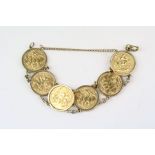 Full sovereign coin 9ct yellow gold bracelet, six full sovereigns dated 1959, 1962, three x 1963 and