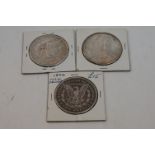 Three United States Of America silver Morgan Dollar coins to include dates 1896, 1899 and 1894,