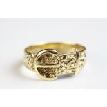 9ct yellow gold buckle ring, width at widest point approx 10mm, ring size T½