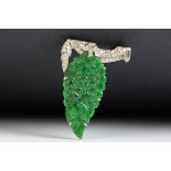 Art Deco jade type and diamond white metal brooch, carved grape and leaf design with small round