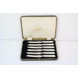 Art Deco mother-of-pearl handled silver fruit knifes, tapered faceted handles, silver collars and