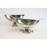 Pair of George III silver marquise open salt cellars raised on pedestal foot, crest to body,