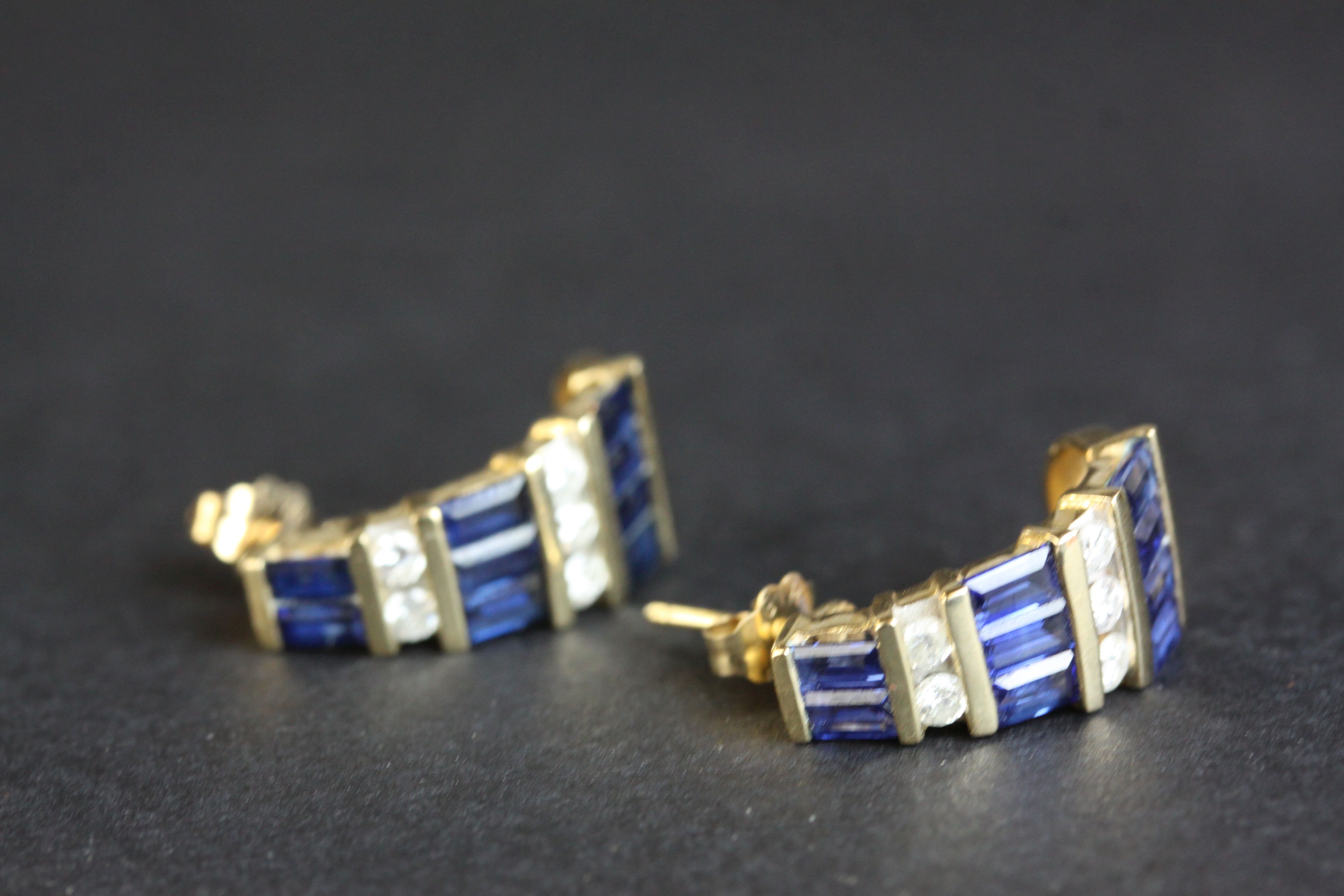 Diamond and sapphire 10ct yellow gold half hoop stud earrings, tapered design, nine baguette cut