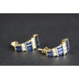 Diamond and sapphire 10ct yellow gold half hoop stud earrings, tapered design, nine baguette cut