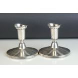 Pair of Swedish silver dwarf candlesticks, inverted bell shaped sconce to short tapered stem,