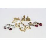 Four pairs of 9ct gold drop and stud earrings to include opals and rubies (4)