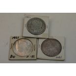Three United States Of America silver Morgan Dollar coins to include dates 1900, 1902 and 1921,