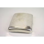 Edwardian silver cigarette case, plain polished curved rectangular form, engraved Tudor rose to
