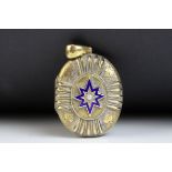Victorian enamelled pearl set oval locket, single seed pearl to centre, blue enamelled star shaped