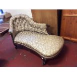 Victorian Mahogany Framed Chaise-lounge, with button back and raised on carved scrolling supports