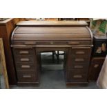 Victorian Oak Twin Pedestal Roll Top Desk, with central drawers and the two pedestals with four