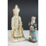 Two Chinese partly glazed pottery figures, largest 27cms high