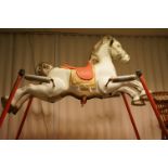 Vintage Mobo child's rocking horse with sprung painted tubular steel frame, 98cms long