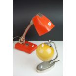 A 1960s/70 red desk lamp of art deco style with dimmer control together with retro lamp with