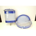 A vintage blue enamel metal Continental water drinking fountain in two parts.