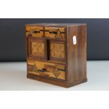 Miniature Walnut Cabinet, the drawers and doors with specimen wood inlay, 18cms wide x 18cms high