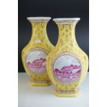 Pair of 20th century Chinese Yellow Ground Vases decorated with panels of European Landscape