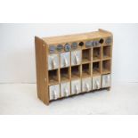 Mid 20th century German ' Gebruder Haarer ' Pine Wall Hanging Cabinet, the eighteen pigeon holes