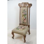 19th century Chair with carved top rail and barley-twist supports, needlework upholstery to back