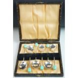 Cased set of 1930's / 40's EPNS Coffee Bean Spoons with green coffee bean terminals