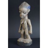 African Carved Figure of a Woman, 29cms high