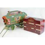 Model of a Gypsy Caravan, 35cms high together with a Lipton Tea Table Top Chest of Four Drawers,