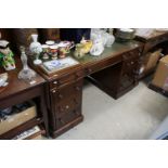 Mid 19th century style Oak Twin Pedestal Desk with green leather inset top and an arrangement of