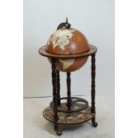 20th century Cocktail Cabinet in the form of a Globe, raised on castors, 89cms high