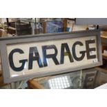 A framed and glazed Garage sign.