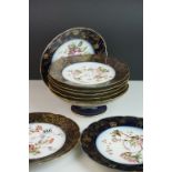 A set of six Haviland Limoge floral decorated cabinet plates together with two similar plates and