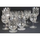 Part suite of Edwardian glasses, engraved with foliate decoration, various sizes and shapes