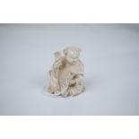 Antique Japanese / Chinese Carved Ivory Figure of a Seated Man holding Cups, 6cms high