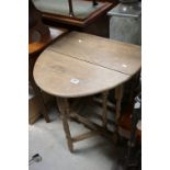 Small Pale Oak Oval Gate-leg Table, 56cms long x 72cms high