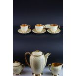 Early 20th Century Carlton ware coffee set, enamelled with green dots on a yellow ground, comprising