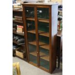19th / Early 20th century Display Cabinet with twin glazed doors opening to reveal four shelves,