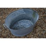 A galvanised vintage tin bath.