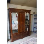 Edwardian Mahogany Inlaid Wardrobe, the two mirrored doors flanking a central panel, over two