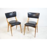 Pair of Mid 20th century Ben Chairs, with padded black vinyl covered backs and seats, 86cms high x