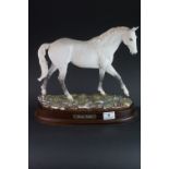 Royal Doulton model of Desert Orchid DA134, no. 4498, on wooden plinth with name plaque, 32ms high
