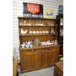 19th century Pine Dresser, the upper section with two shelves, above two drawers and two