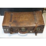 An antique leather suitcase.